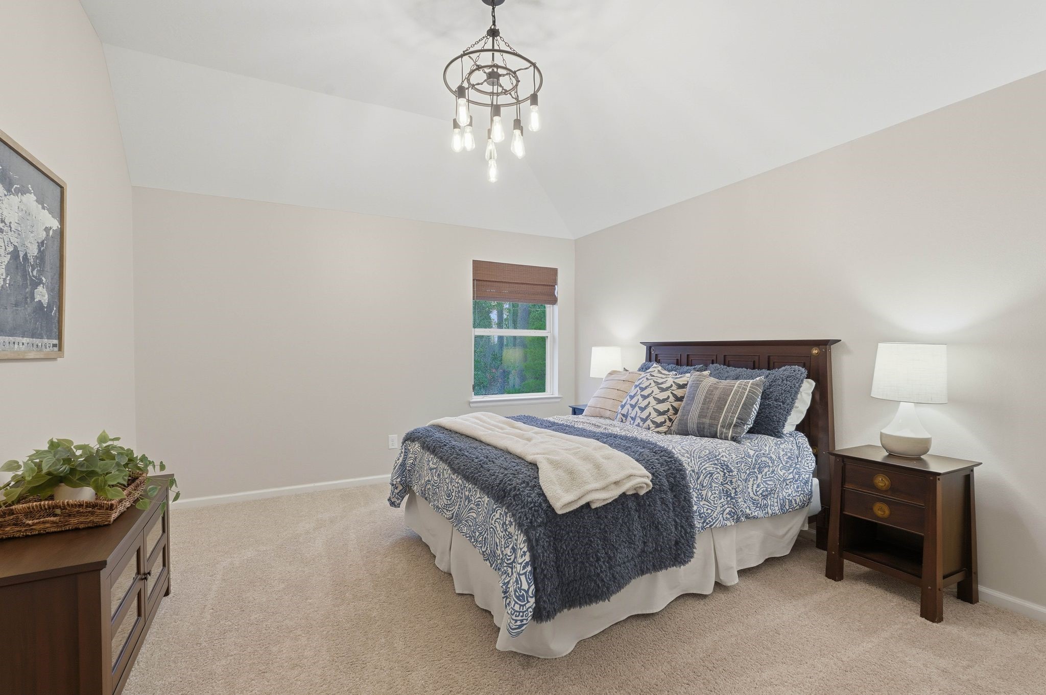 147 West Valera Ridge Place The Woodlands, TX 77389 - Photo 30 of 50 Second bedroom upstairs with updated lighting and roomy closet.