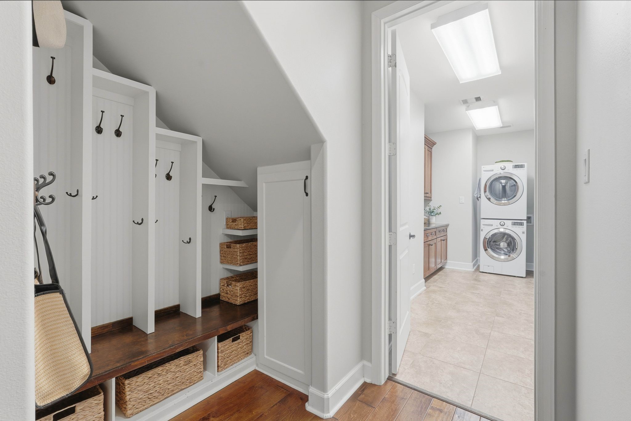 147 West Valera Ridge Place The Woodlands, TX 77389 - Photo 35 of 50 The sellers created the MUD area underneath the stairs coming in from the main garage. Plenty of storage for the "drop zone".