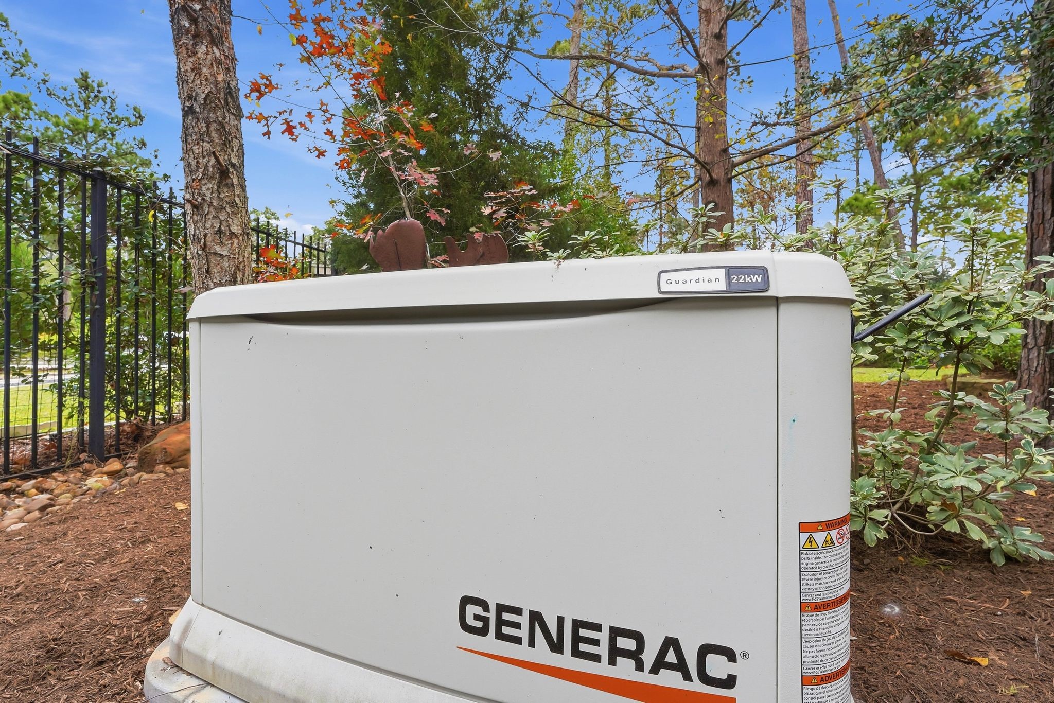 147 West Valera Ridge Place The Woodlands, TX 77389 - Photo 40 of 50 22kW Generac generator ensures uninterrupted power during outages.