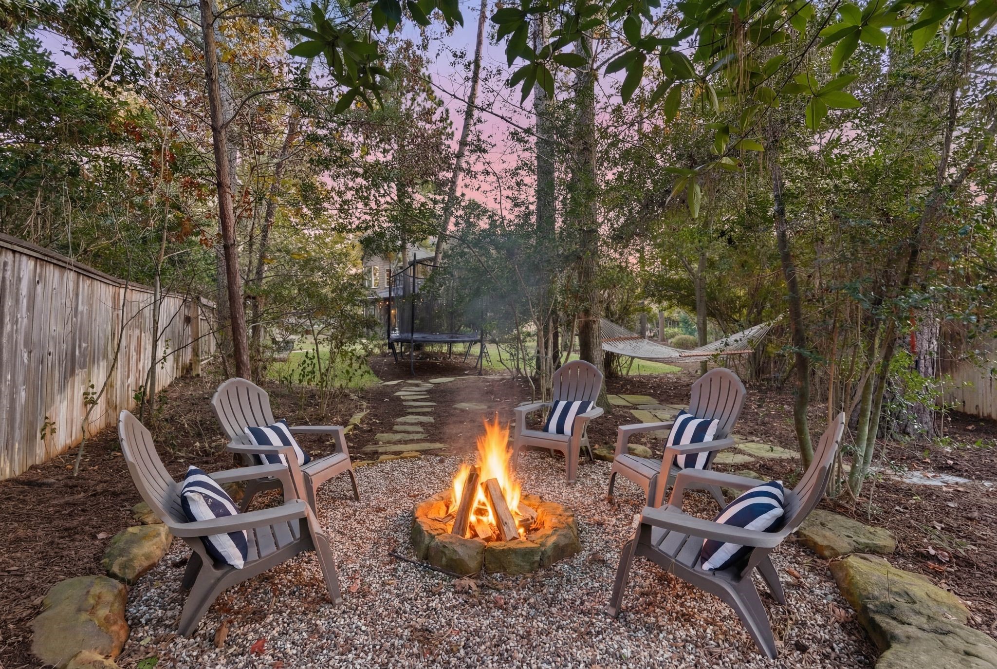147 West Valera Ridge Place The Woodlands, TX 77389 - Photo 45 of 50 Family nights in the backyard will have you feeling like you're one with nature.