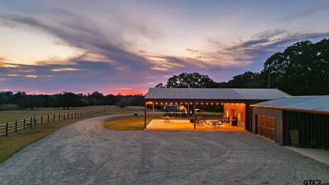 a view of a lake in middle of forest