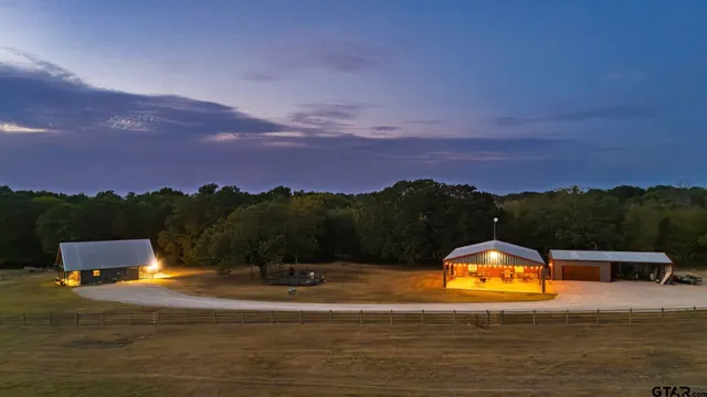 a view of a lake with sunset