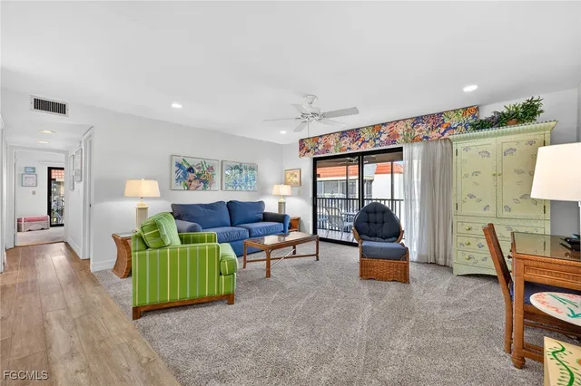 a view of balcony with furniture