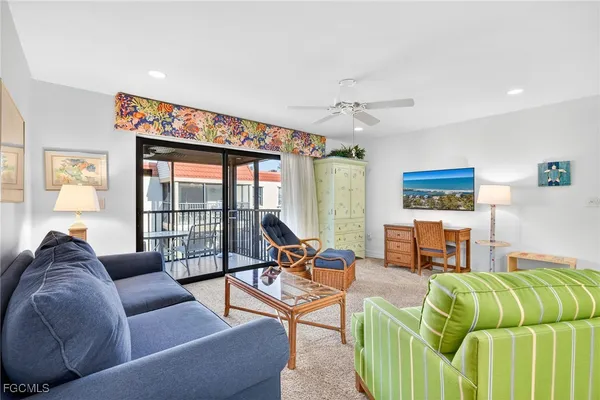 a view of balcony with furniture