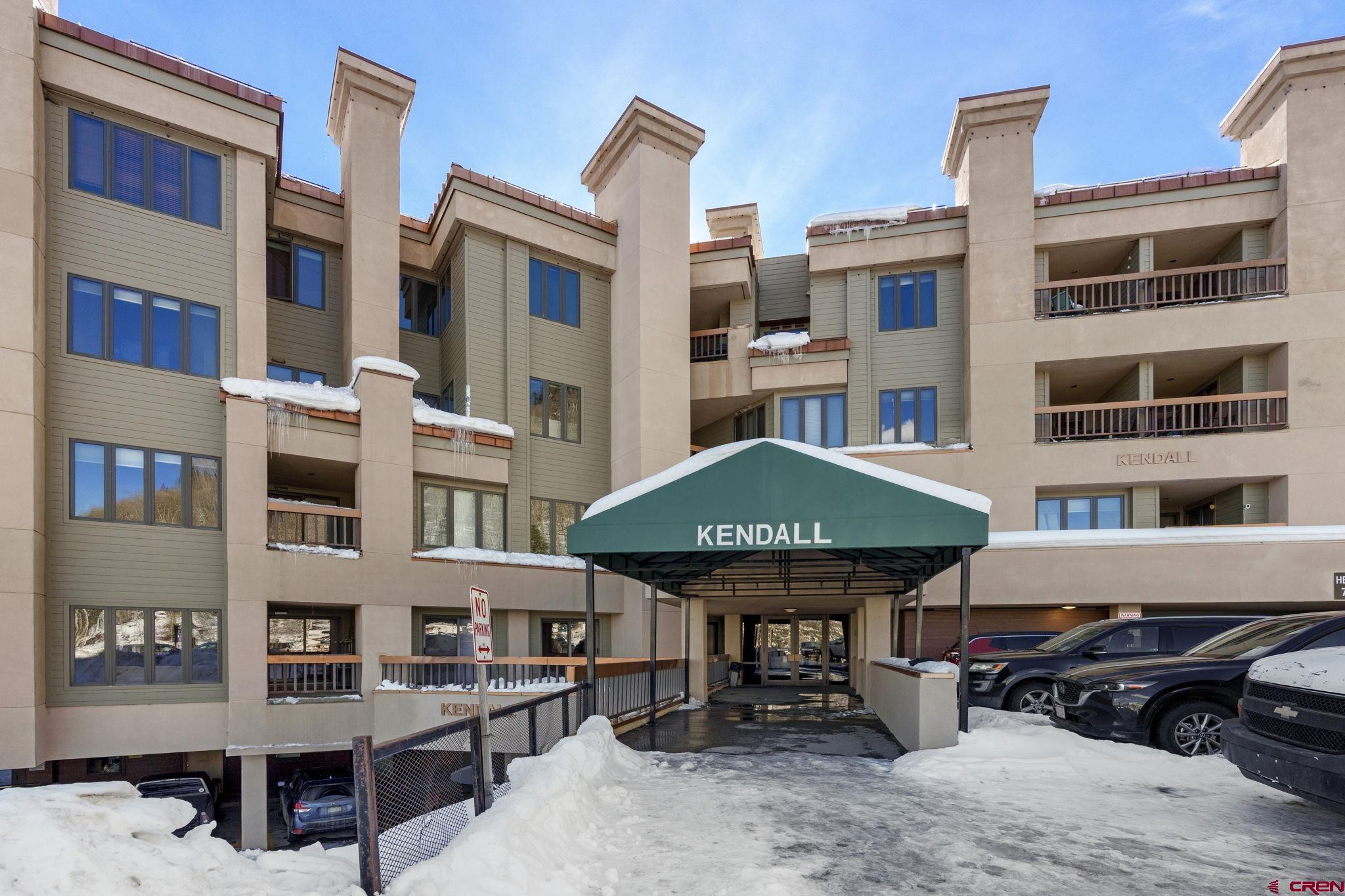 71 Needles Way, Unit 440 Durango, CO 81301 - Photo 13 of 31 a front view of a building with many windows