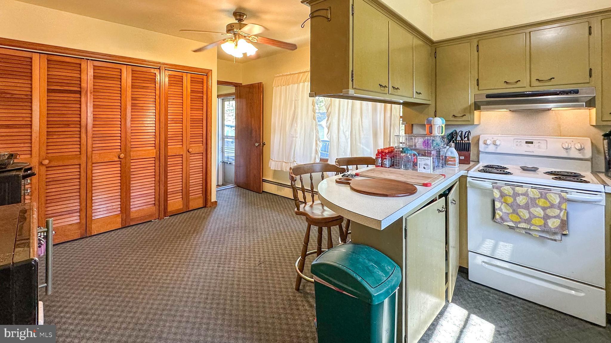 57 Mountain View Road Bethel, PA 19507 - Photo 12 of 31 a kitchen that has a sink and a stove