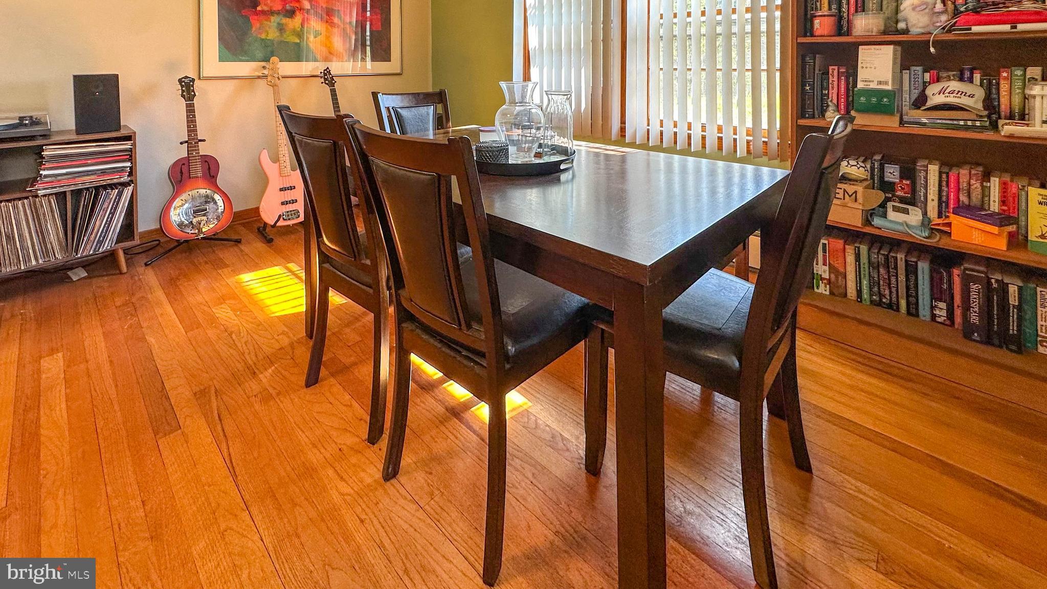 57 Mountain View Road Bethel, PA 19507 - Photo 17 of 31 a dining room with furniture and a book shelf