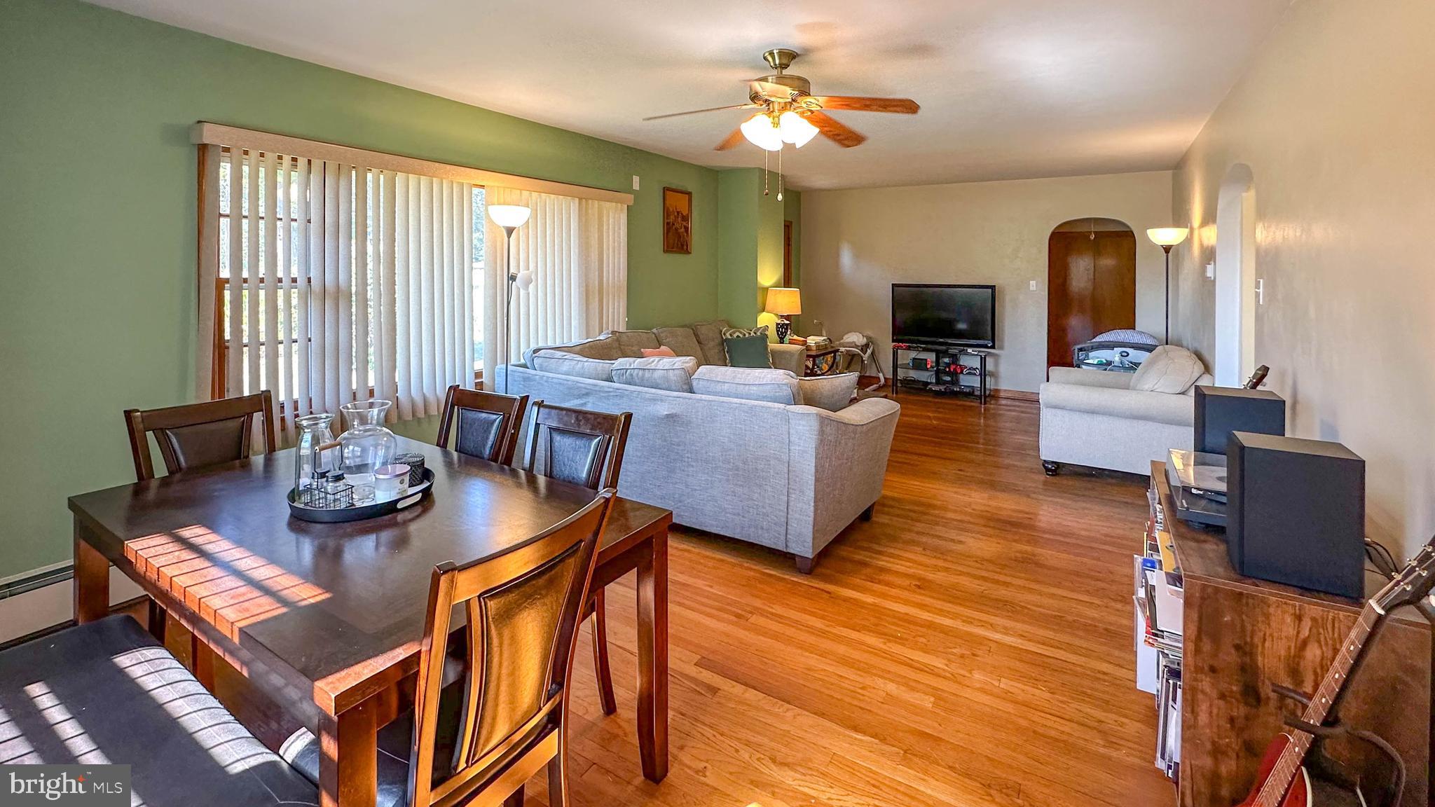 57 Mountain View Road Bethel, PA 19507 - Photo 19 of 31 a view of a dining room with furniture window and wooden floor