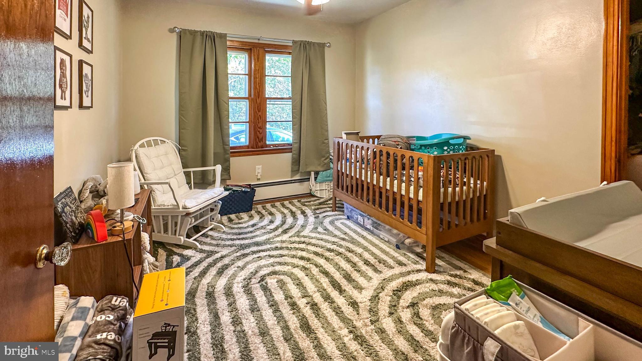 57 Mountain View Road Bethel, PA 19507 - Photo 22 of 31 a bedroom with a bed and a window