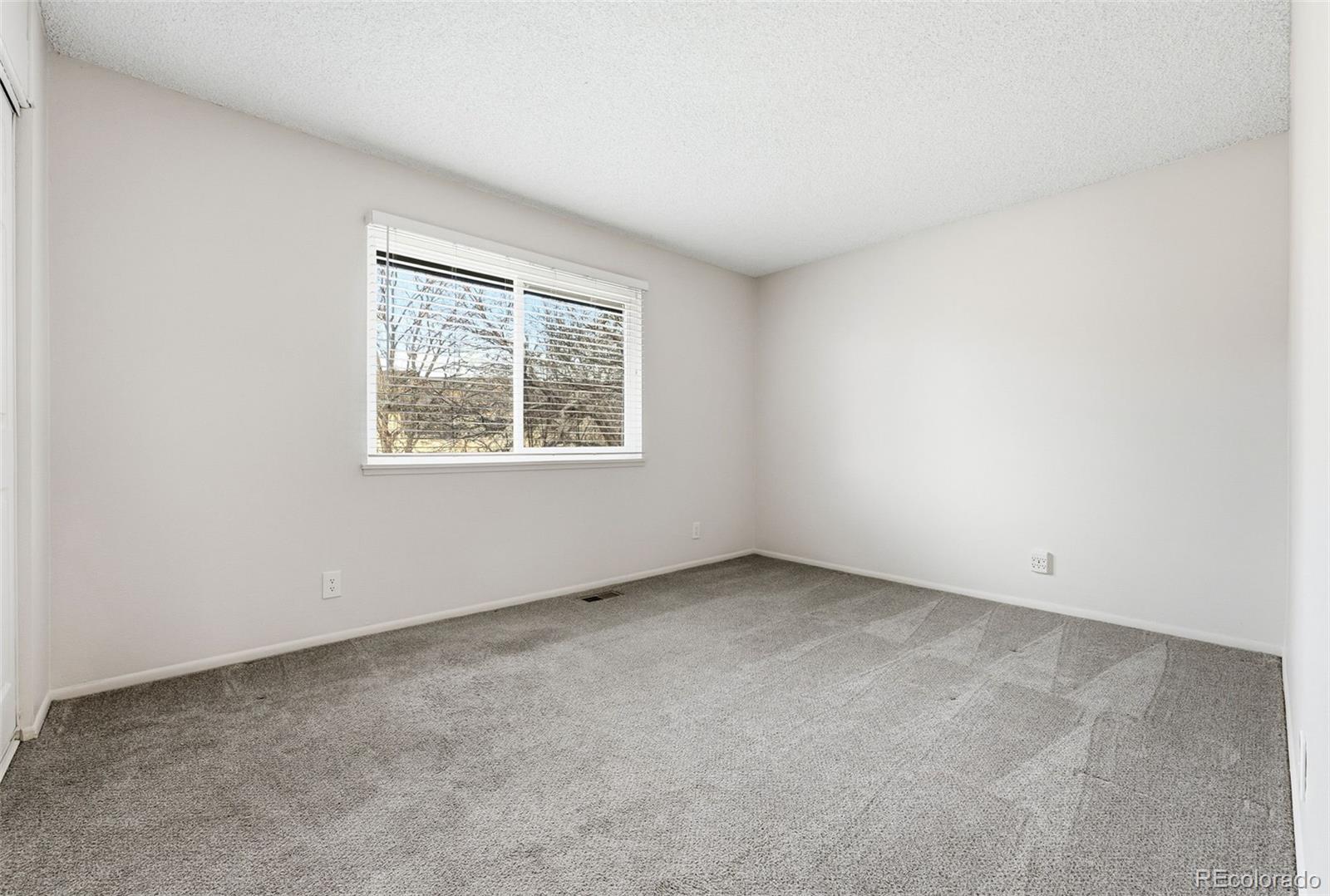 508 South Carr Street, Unit 118 Lakewood, CO 80226 - Photo 25 of 42 an empty room with a window