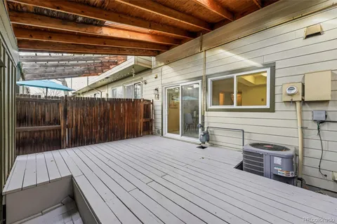a view of a backyard with wooden floor