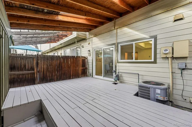 a view of a backyard with wooden floor