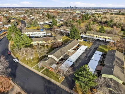 an aerial view of residential houses with outdoor space