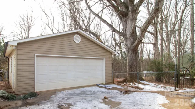 a backyard of a house with shower and outdoor space