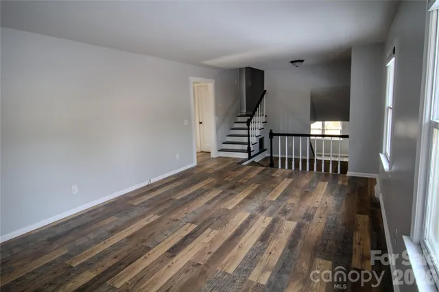 a view of entryway with wooden floor