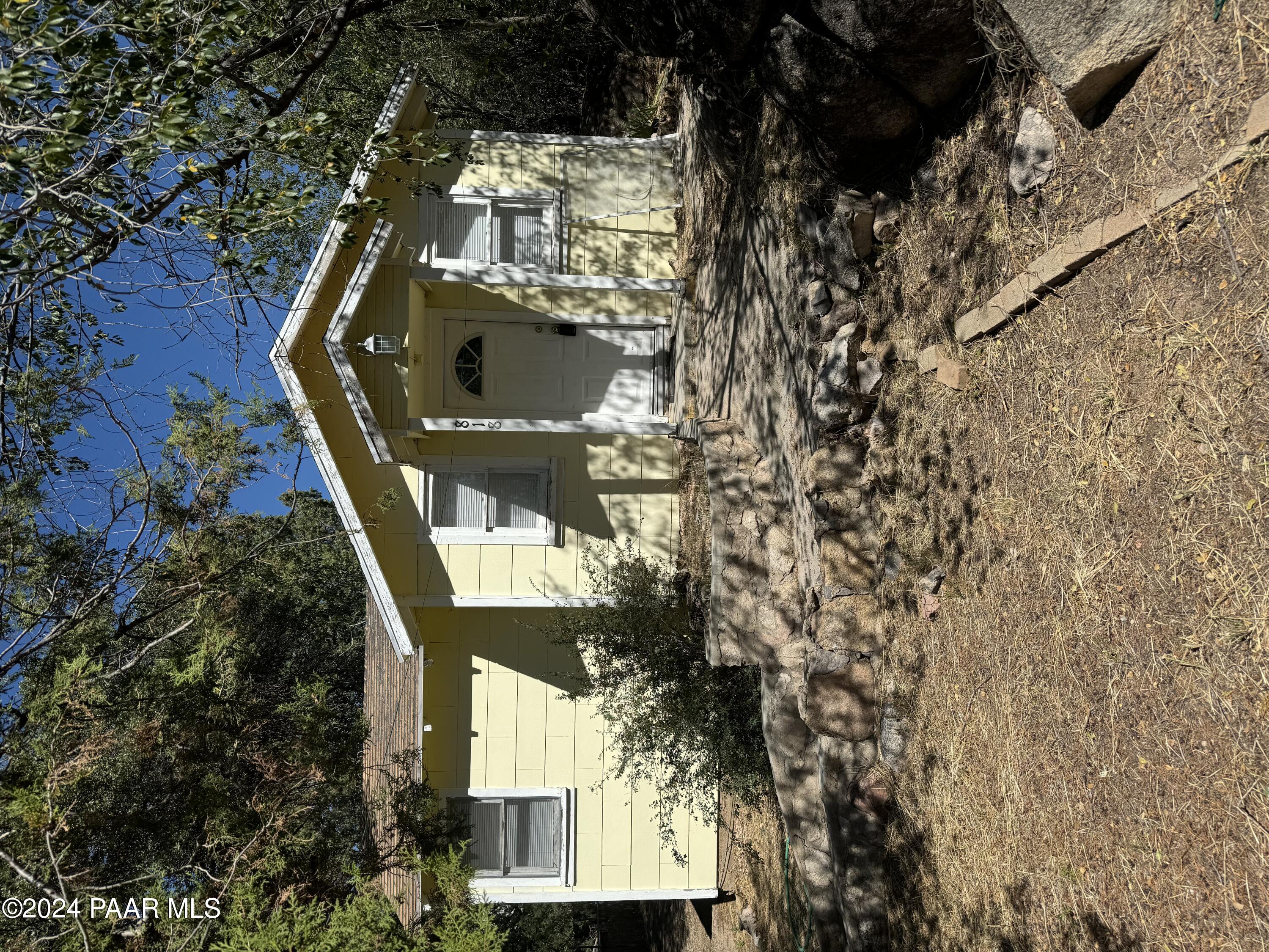 818 West Rosser Street Prescott, AZ 86301 - Photo 1 of 7 a view of a house with a yard