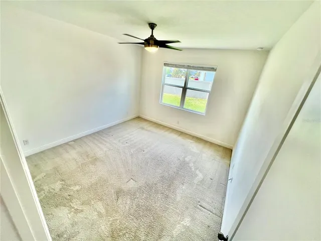 a bathroom with a double vanity sink mirror and