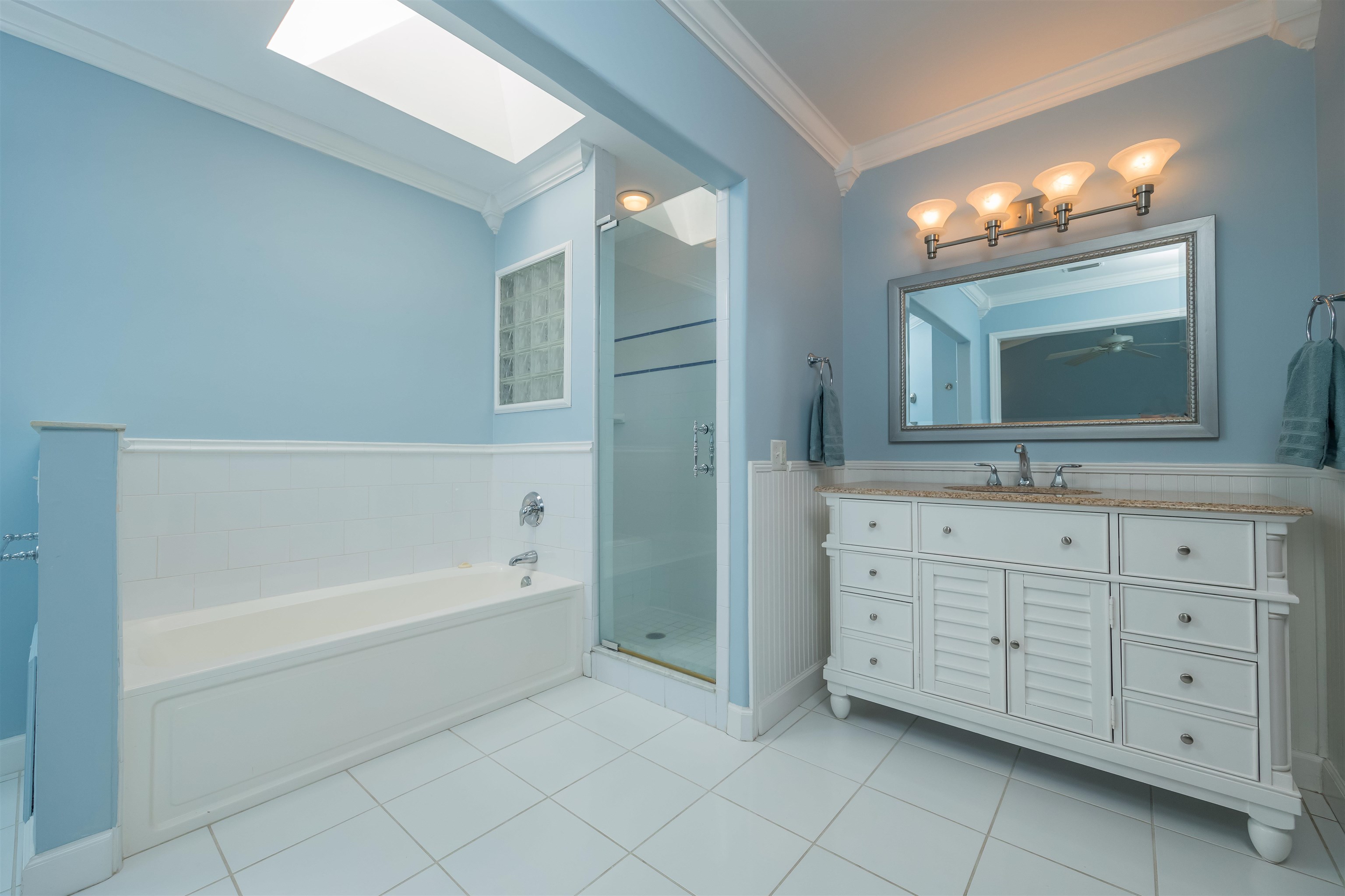3285 Turtle Creek Road St. Augustine, FL 32086 - Photo 28 of 37 a bathroom with a sink double vanity and a bathtub