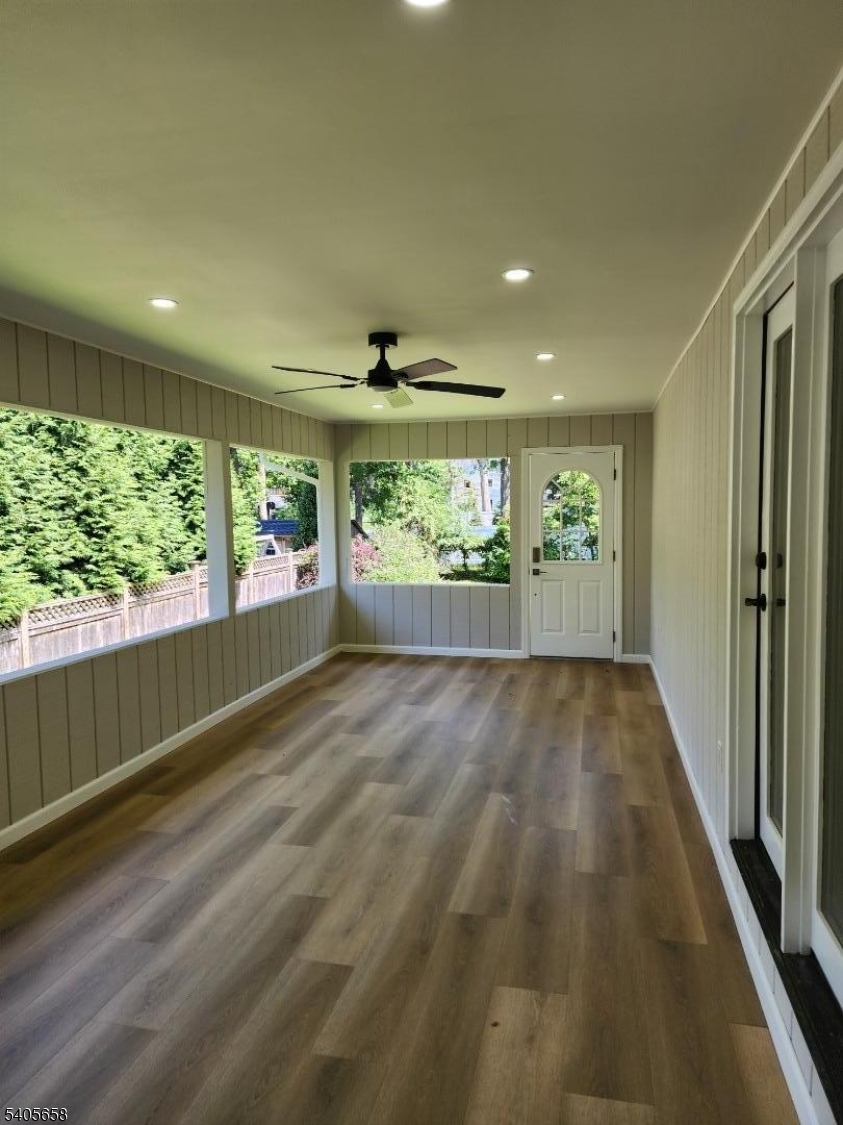 23 Old Farm Road Berkeley Heights, NJ 07922 - Photo 12 of 28 an empty room with wooden floor and windows
