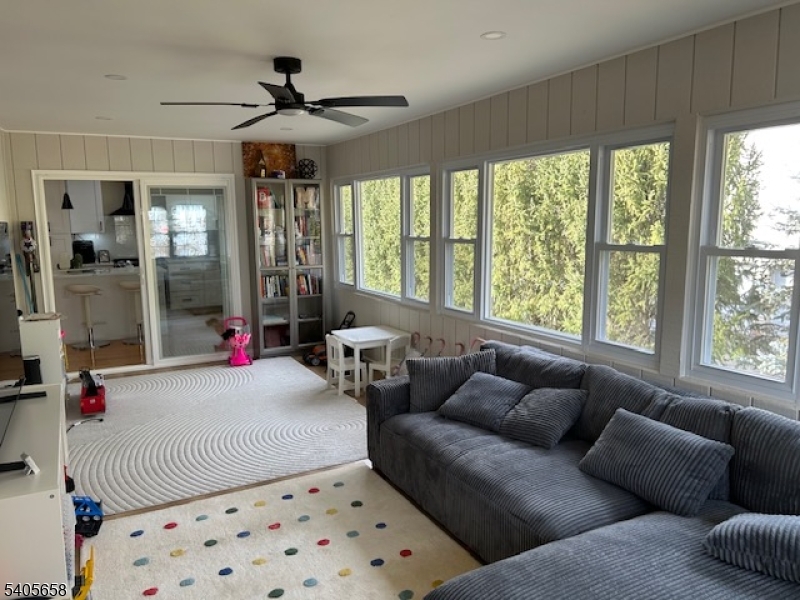 23 Old Farm Road Berkeley Heights, NJ 07922 - Photo 19 of 28 a living room with furniture and a large window