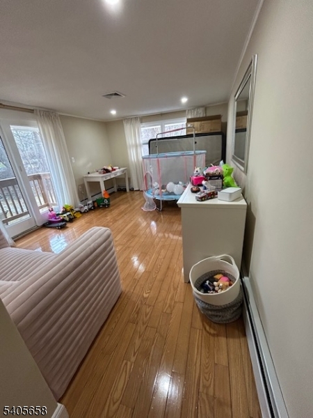 23 Old Farm Road Berkeley Heights, NJ 07922 - Photo 22 of 28 a view of a room with furniture and toys