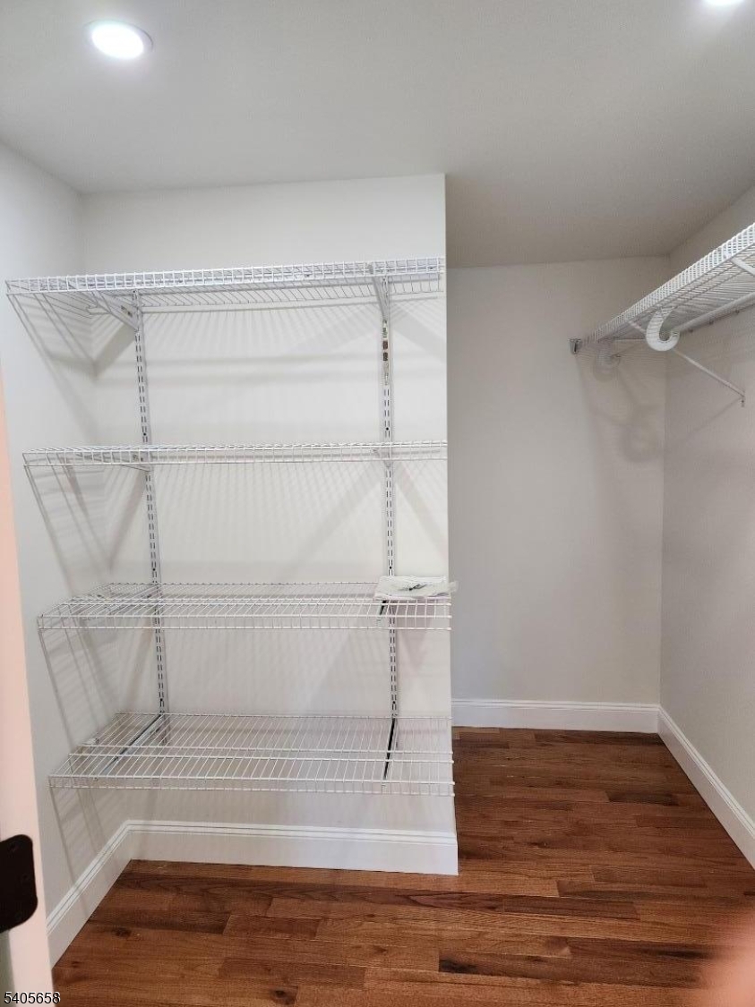23 Old Farm Road Berkeley Heights, NJ 07922 - Photo 8 of 28 a view of an empty walk in closet