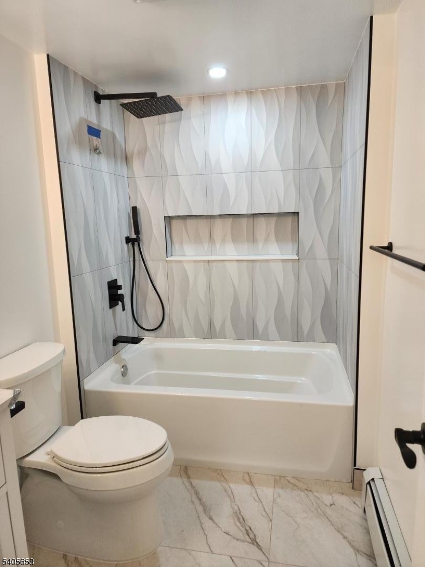 23 Old Farm Road Berkeley Heights, NJ 07922 - Photo 10 of 28 a bathroom with a toilet and a shower