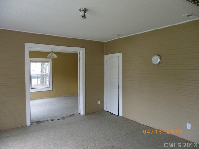 1497 Flat Creek Road Lancaster, SC 29720 - Photo 3 of 9 an empty room with windows