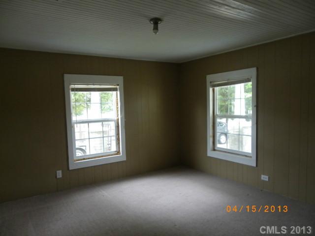 1497 Flat Creek Road Lancaster, SC 29720 - Photo 8 of 9 an empty room with windows