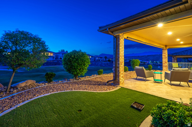2212 Chippenham Court St. George, UT 84770 - Photo 22 of 75 View of grassy yard with a patio
