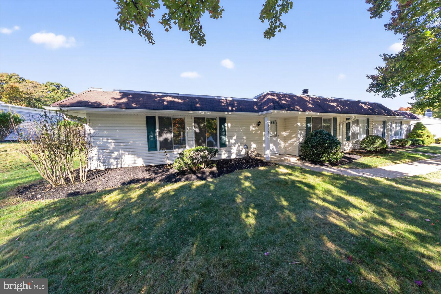14507 Elmhan Court, Unit 182B Silver Spring, MD 20906 - Photo 1 of 21 a view of a house with backyard porch and sitting area