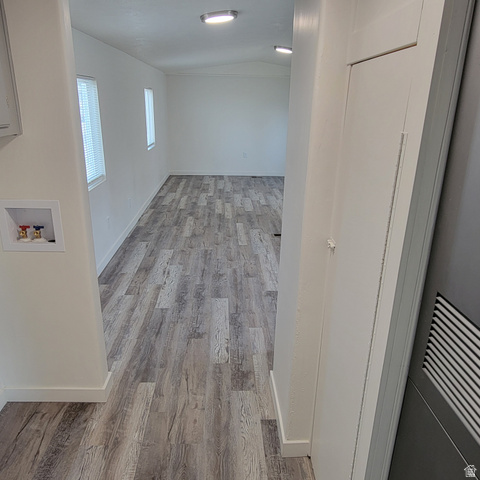 1735 South 1380 West Logan, UT 84321 - Photo 21 of 46 Spacious interior featuring wood-finish flooring, white walls, and contemporary ceiling lighting