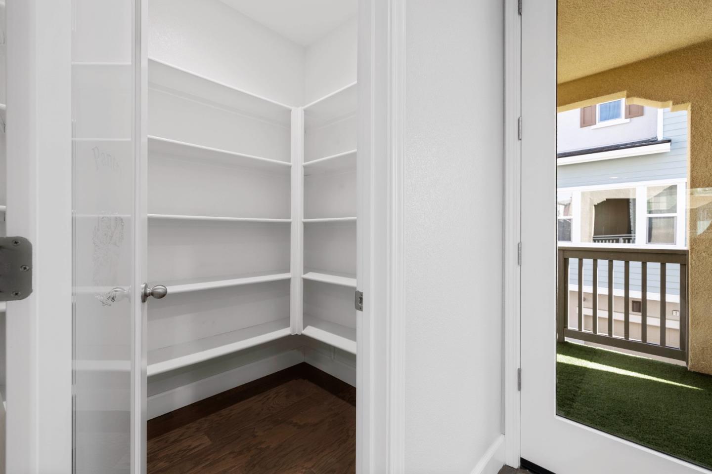 123 Lemmon Terrace Sunnyvale, CA 94086 - Photo 13 of 42 a view of walk in closet with empty racks