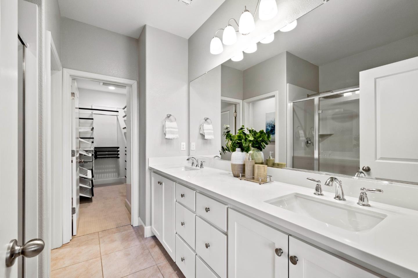123 Lemmon Terrace Sunnyvale, CA 94086 - Photo 20 of 42 a bathroom with a double vanity sink and a mirror