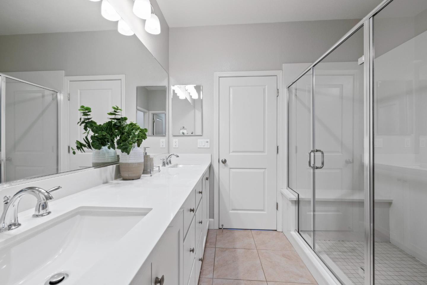 123 Lemmon Terrace Sunnyvale, CA 94086 - Photo 21 of 42 a bathroom with a granite countertop sink a mirror and a shower