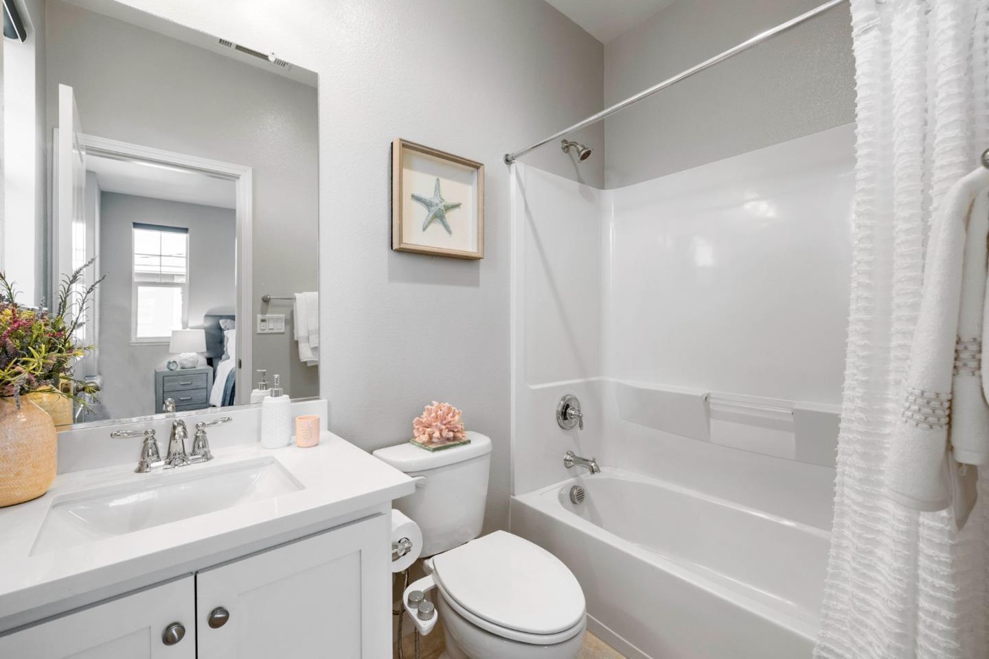 123 Lemmon Terrace Sunnyvale, CA 94086 - Photo 25 of 42 a bathroom with a sink a toilet and a bathtub