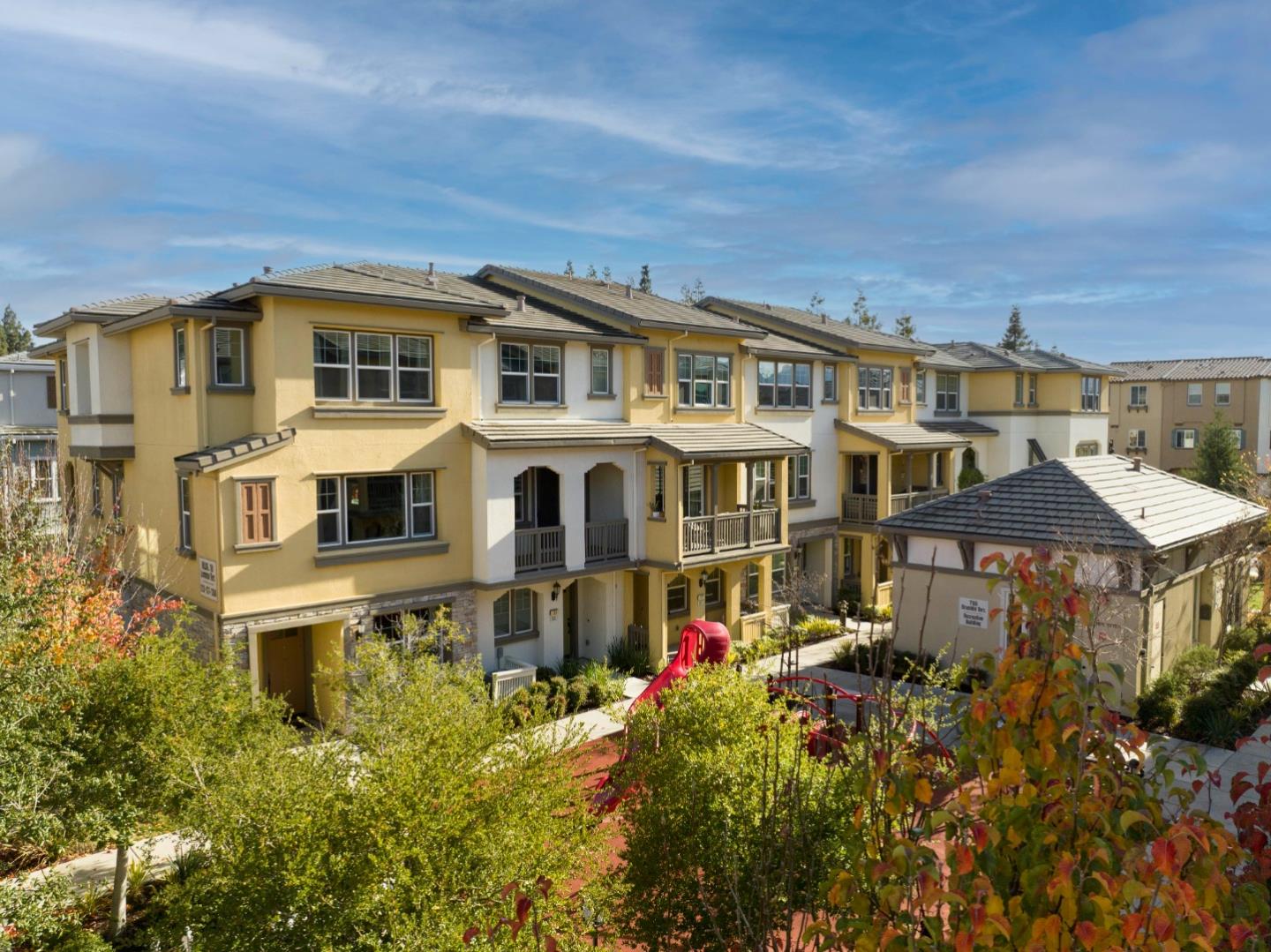123 Lemmon Terrace Sunnyvale, CA 94086 - Photo 37 of 42 a front view of a residential apartment building with a yard