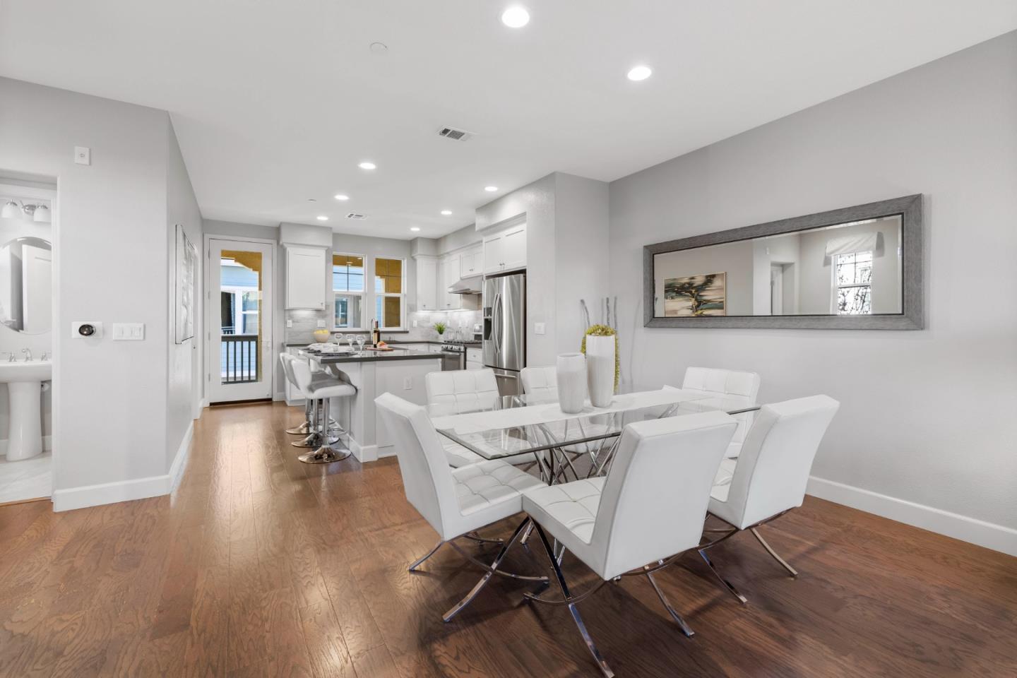 123 Lemmon Terrace Sunnyvale, CA 94086 - Photo 9 of 42 a view of a dining room with furniture and wooden floor