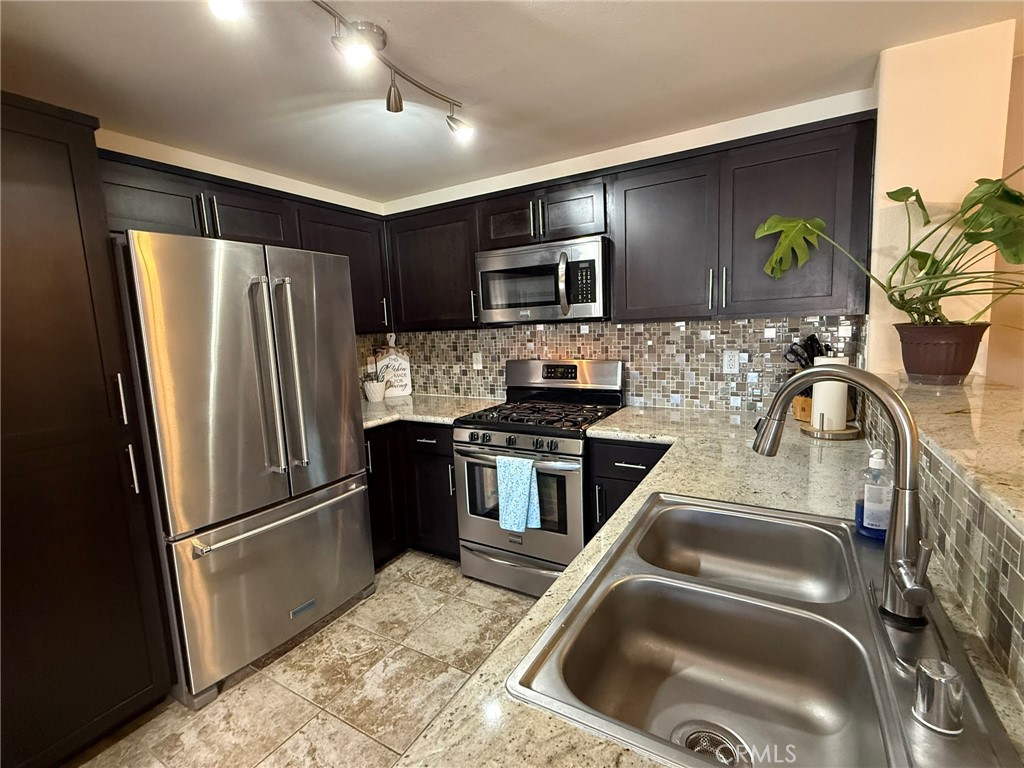 44780 Adam Temecula, CA 92592 - Photo 7 of 42 Newly remodeled kitchen with new Granite counters, cabinetry and stainless appliances