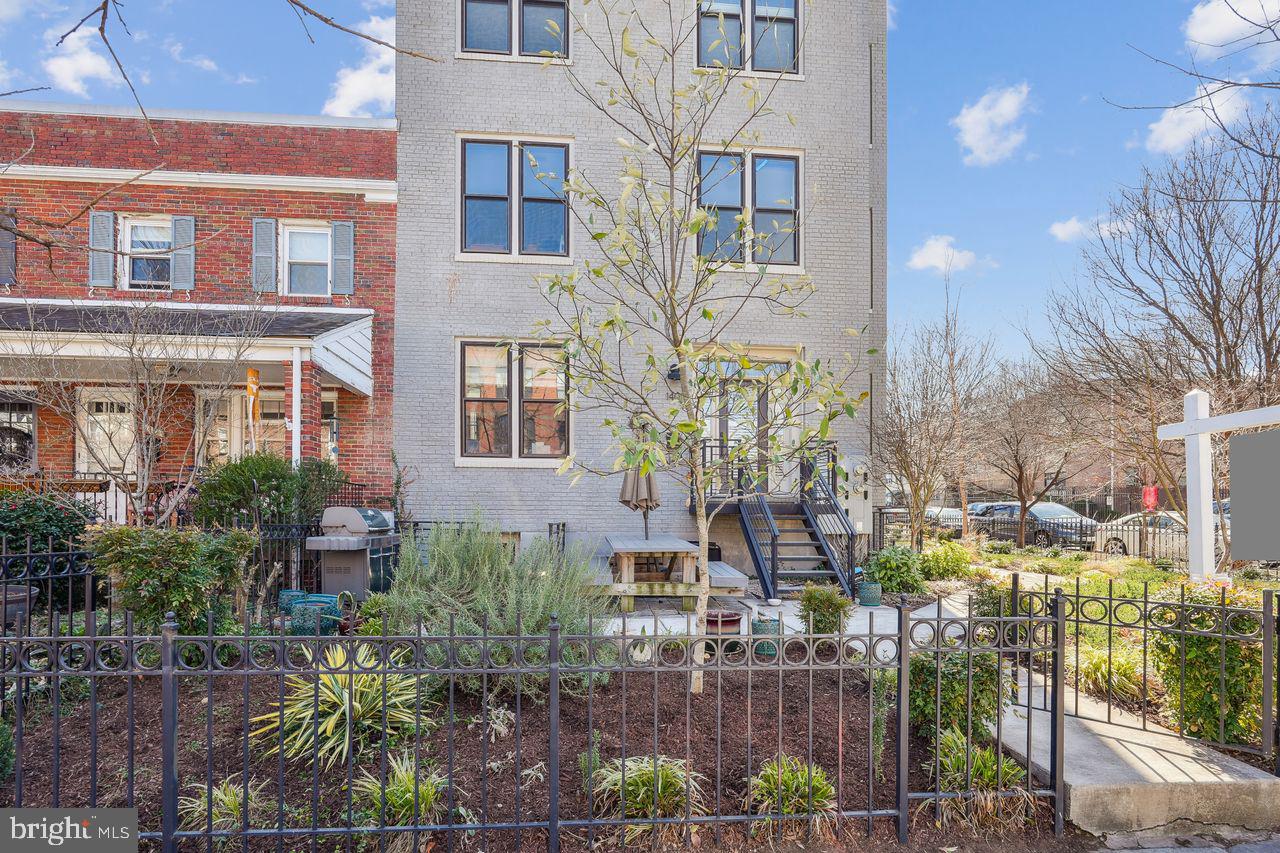 1401 K Street Southeast, Unit 1 Washington, DC 20003 - Photo 2 of 48 a view of multiple house with outdoor space