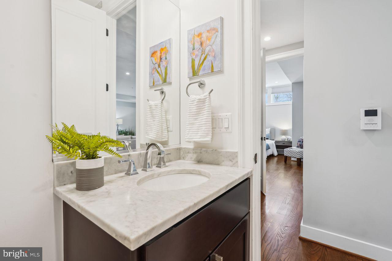 1401 K Street Southeast, Unit 1 Washington, DC 20003 - Photo 33 of 48 a bathroom with a sink and a mirror