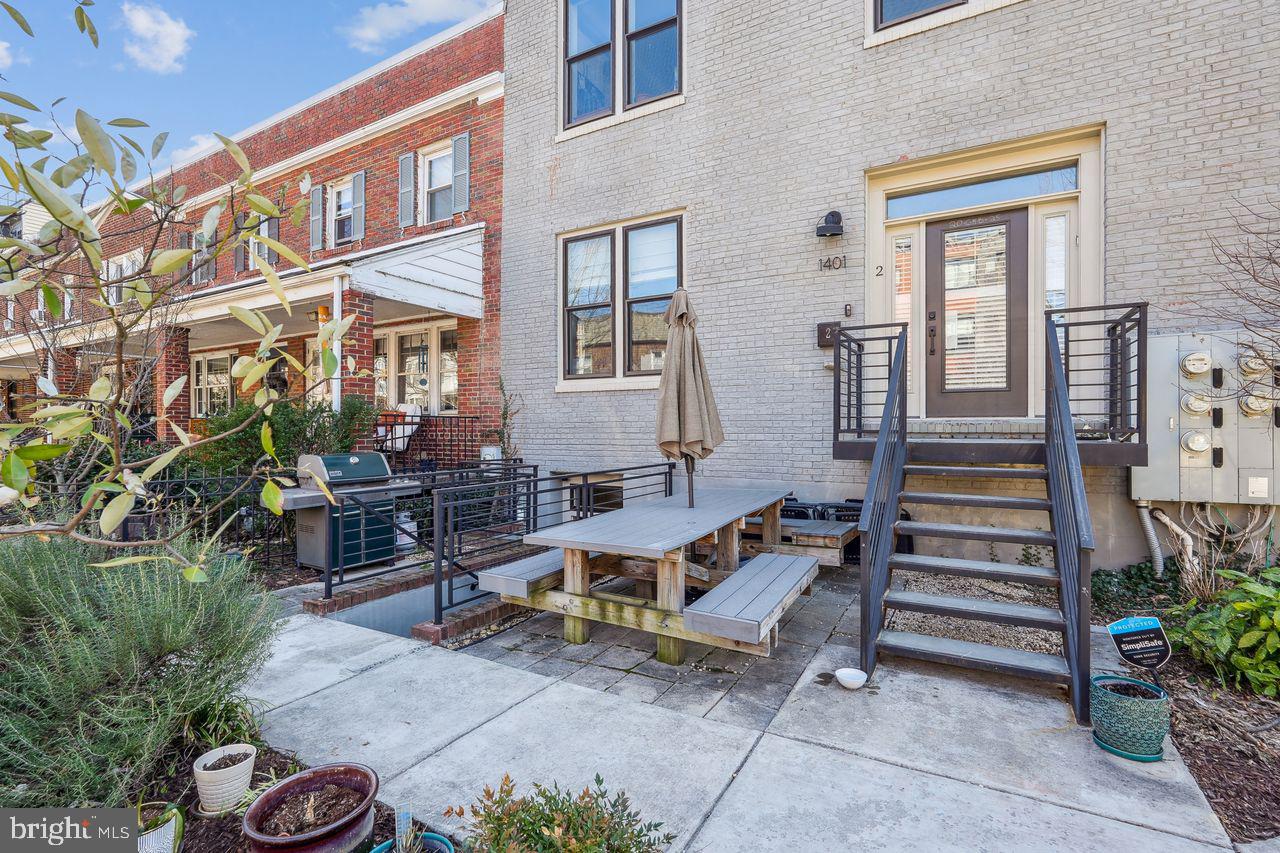 1401 K Street Southeast, Unit 1 Washington, DC 20003 - Photo 4 of 48 a view of a house with backyard and sitting area
