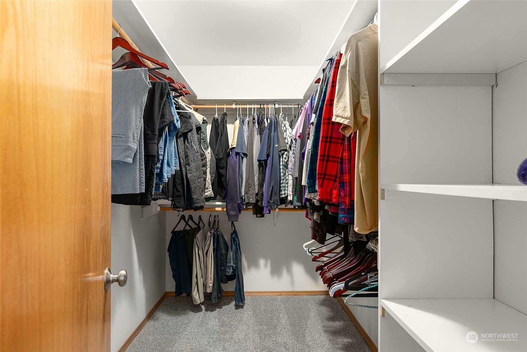 17310 Freestad Road Arlington, WA 98223 - Photo 19 of 29 a view of walk in closet with clothes