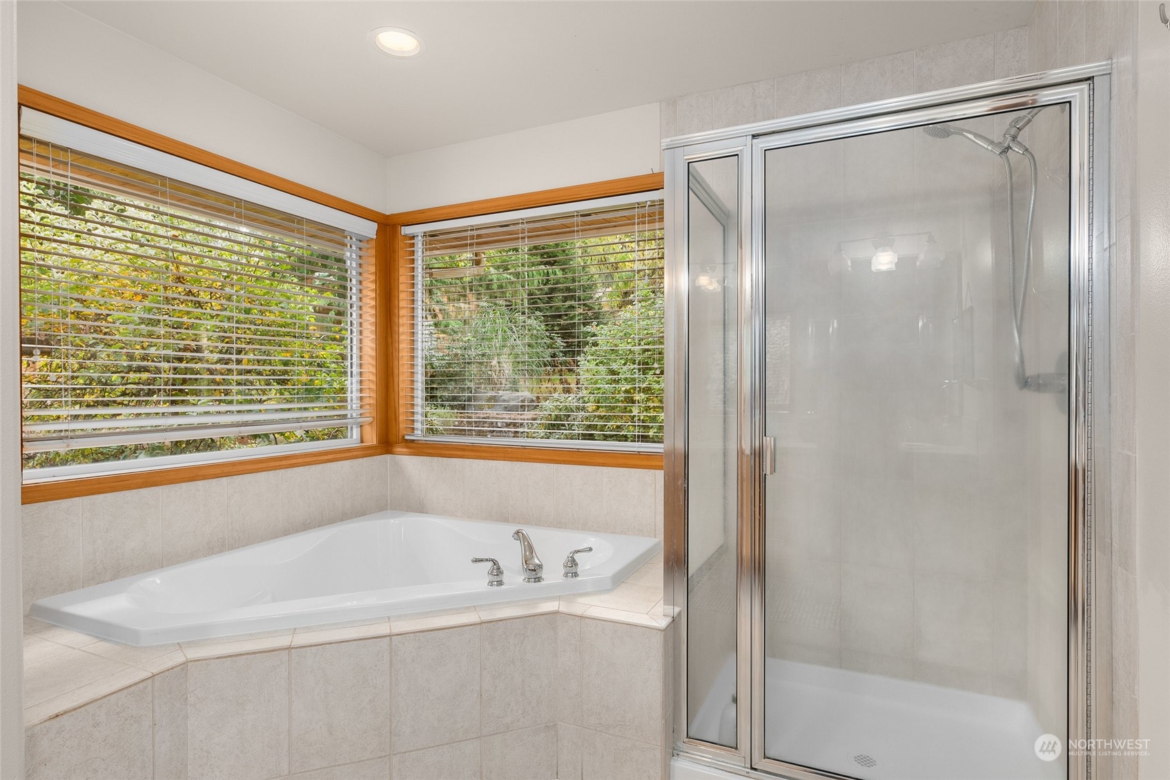 17310 Freestad Road Arlington, WA 98223 - Photo 20 of 29 a bathroom with a bathtub and a shower