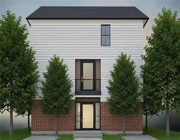 a front view of a house with a yard