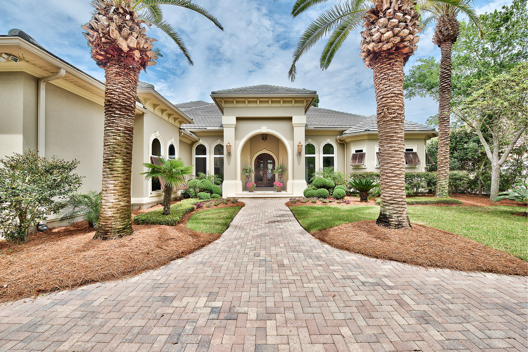 2952 Pine Valley Road Miramar Beach, FL 32550 - Photo 1 of 41 a view of a house with garden and pathway