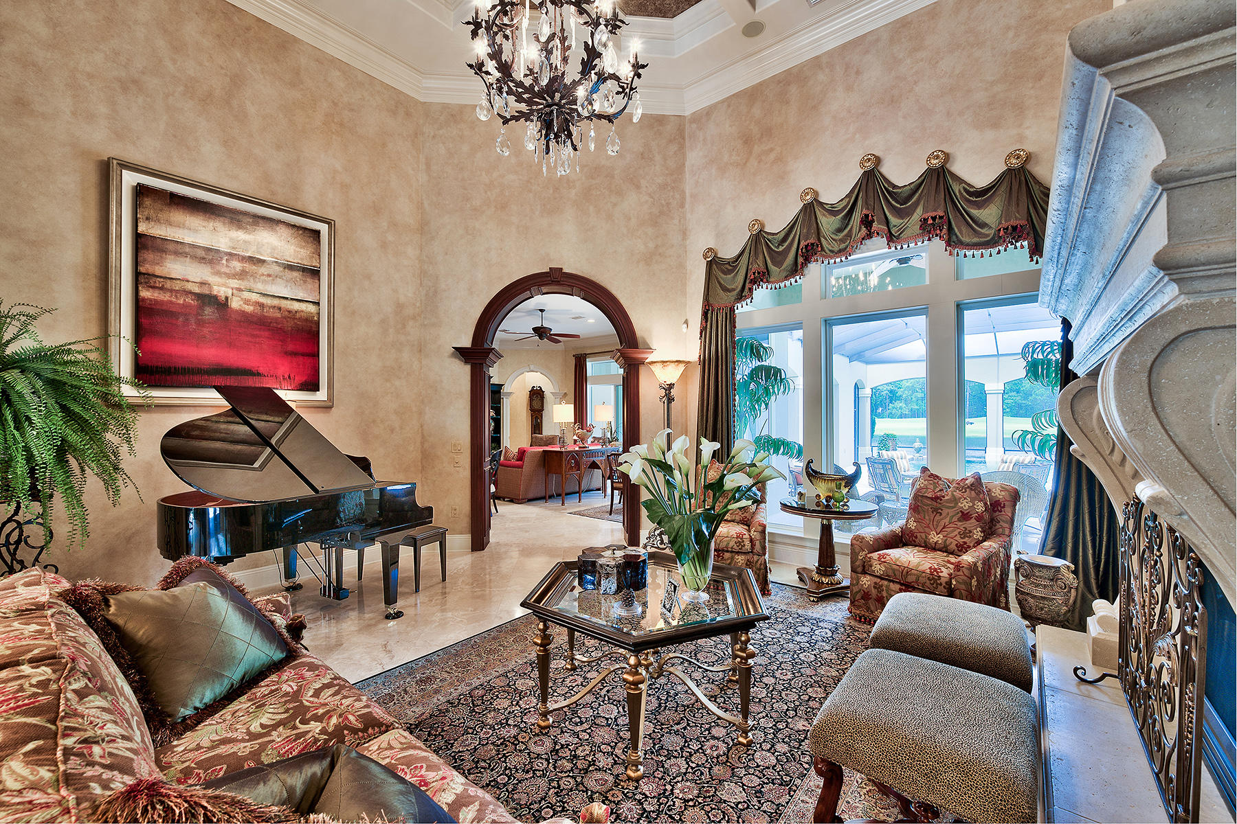 2952 Pine Valley Road Miramar Beach, FL 32550 - Photo 3 of 41 a living room with furniture a chandelier and a flat screen tv