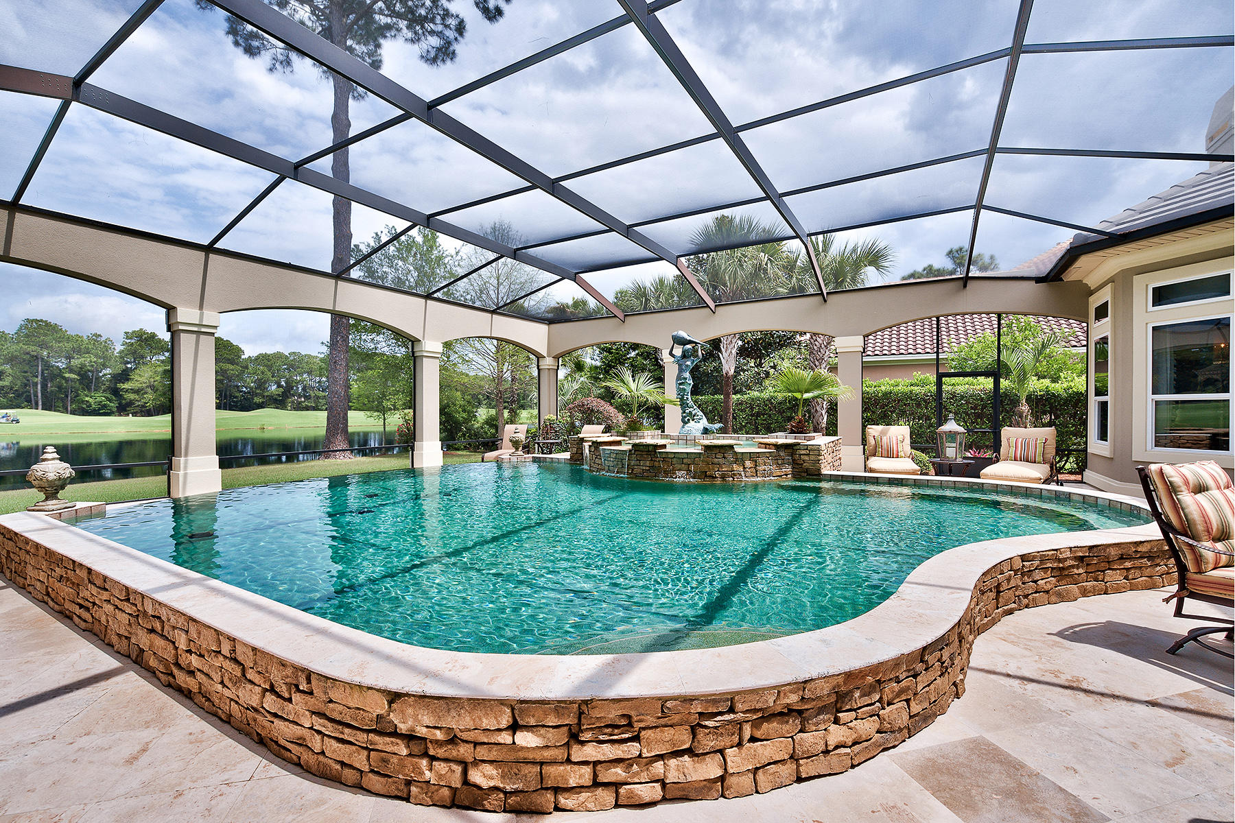 2952 Pine Valley Road Miramar Beach, FL 32550 - Photo 34 of 41 a view of a swimming pool with a porch