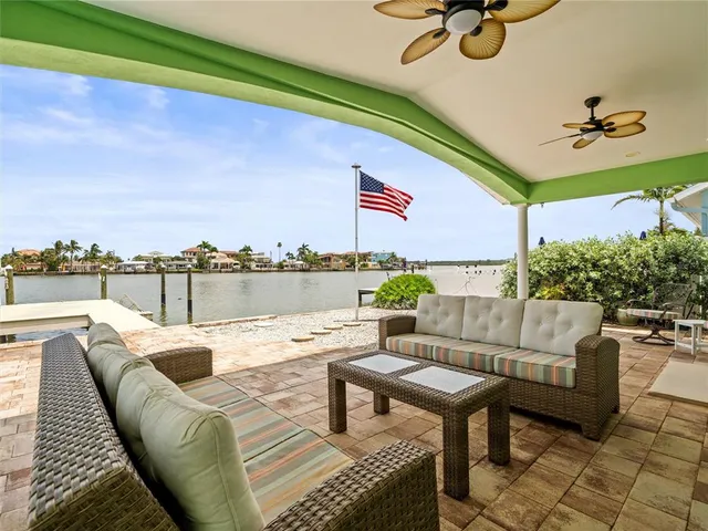 a view of a terrace with furniture and a potted plant