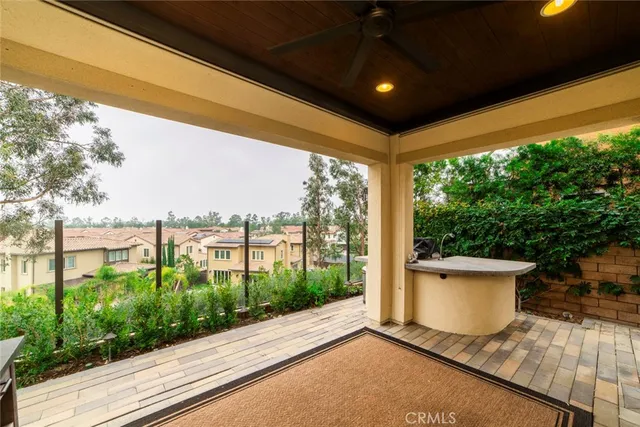 a view of a patio with a yard